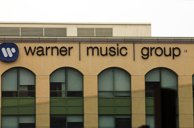 Warner Music Group closed their first day trading 20% above IPO price