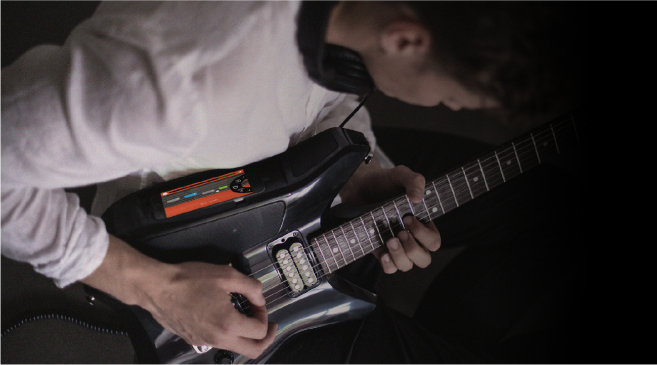 This Fusion guitar has an iPhone dock, amp, speakers built-in
