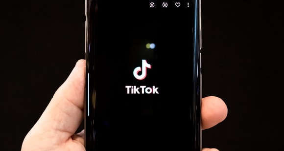 TikTok logo on a phone