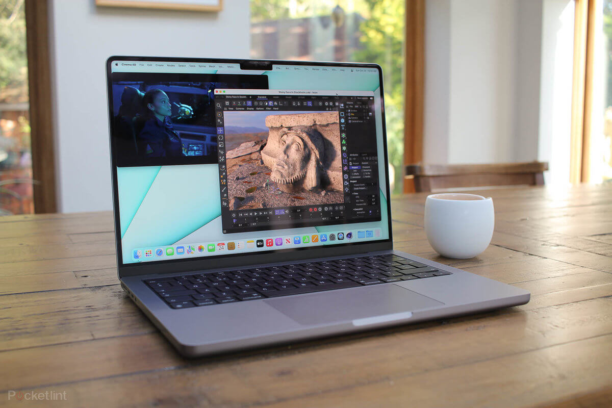 The Apple MacBook Pro 14-inch in a living setting. Transport it anywhere with you & make music on the go! 