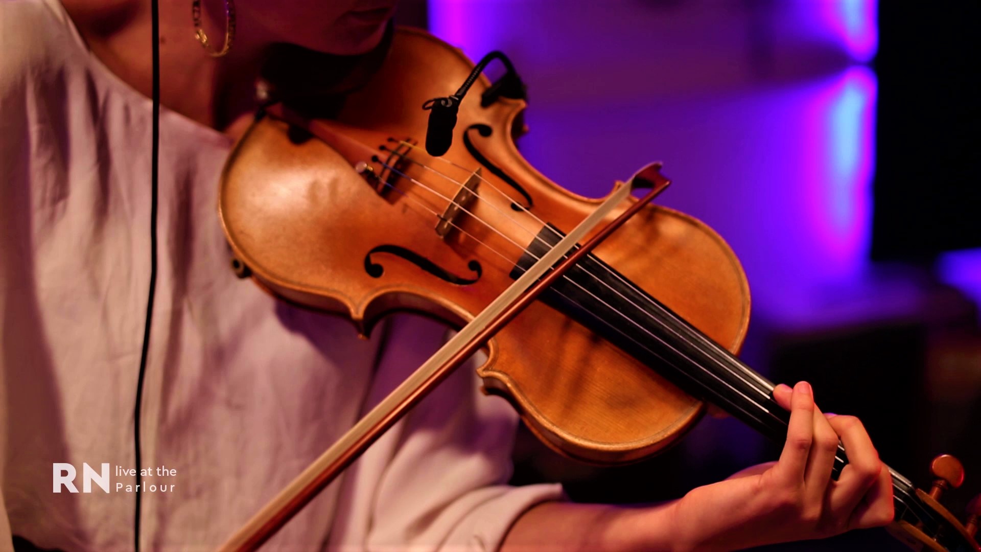 Woman playing classical violin.