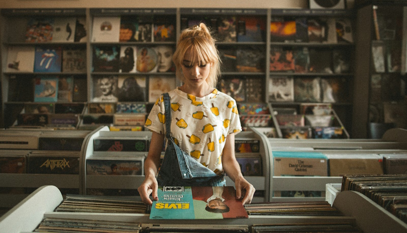 girl browsing records at a music store