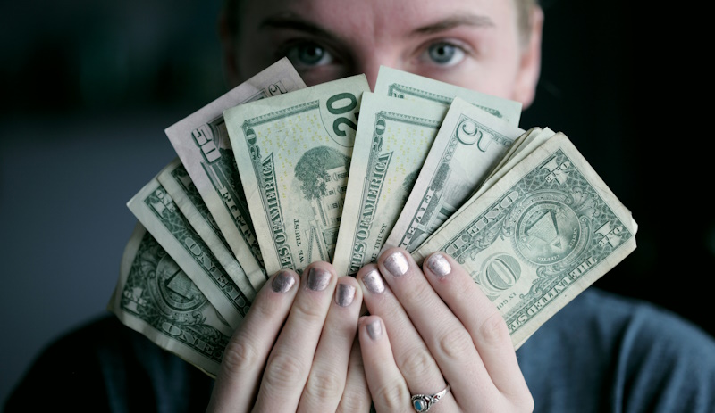 Woman holding cash